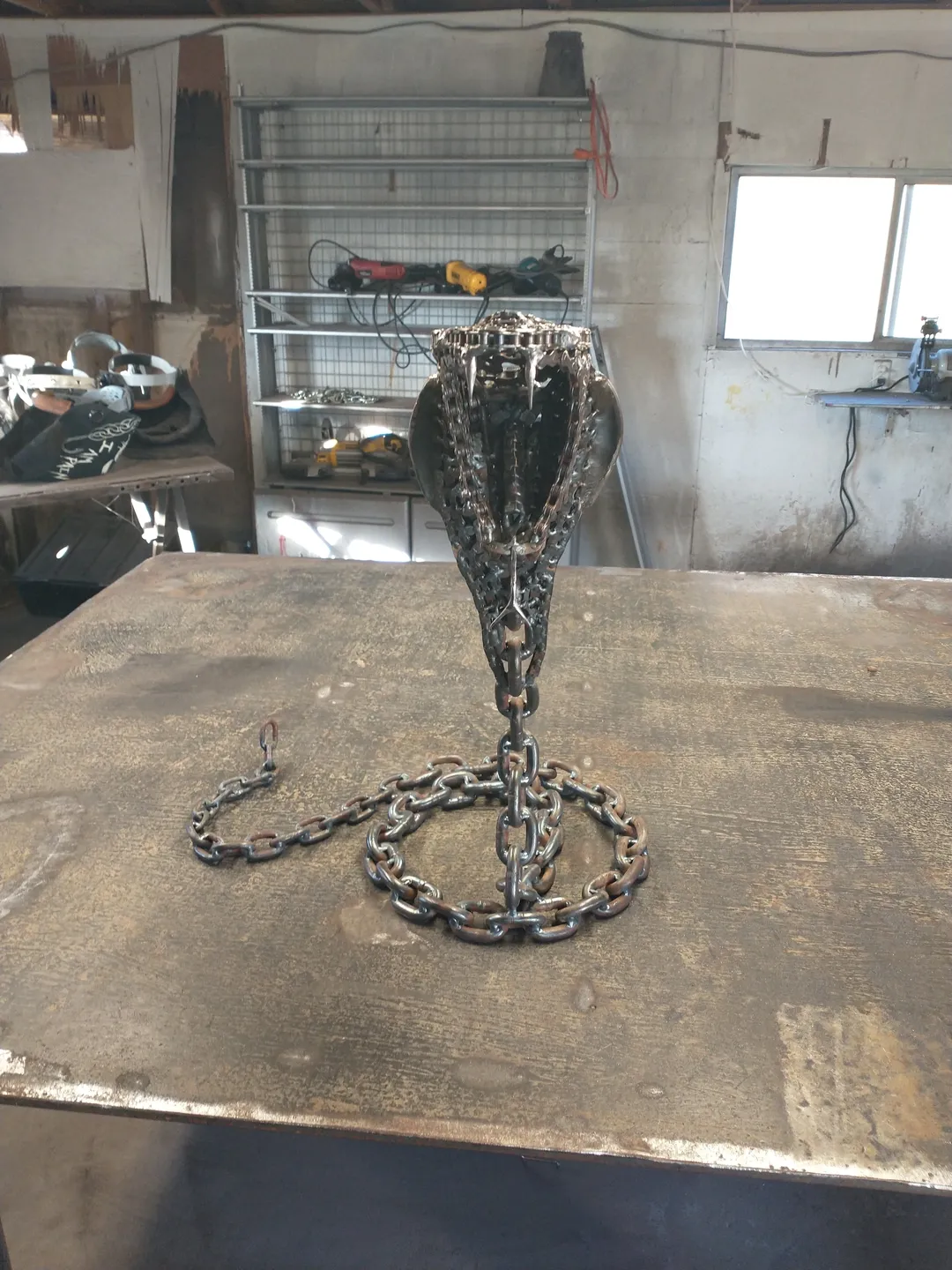 A chain on top of a table with other chains around it.